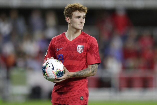United States' Josh Sargent holds a ball during the second half of a CONCACAF Nations League soccer game against Cuba Friday, Oct. 11, 2019, in Washington. The U.S. won 7-0. (AP Photo/Julio Cortez)