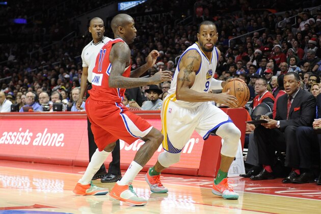 LOS ANGELES, CA - DECEMBER 25: Andre Iguodala #9 of the Golden State Warriors handles the basketball against Jamal Crawford #11 of the Los Angeles Clippers at STAPLES Center on December 25, 2014 in Los Angeles, California. NOTE TO USER: User expressly acknowledges and agrees that, by downloading and/or using this Photograph, user is consenting to the terms and conditions of the Getty Images License Agreement. Mandatory Copyright Notice: Copyright 2014 NBAE (Photo by Juan Ocampo/NBAE via Getty Images)