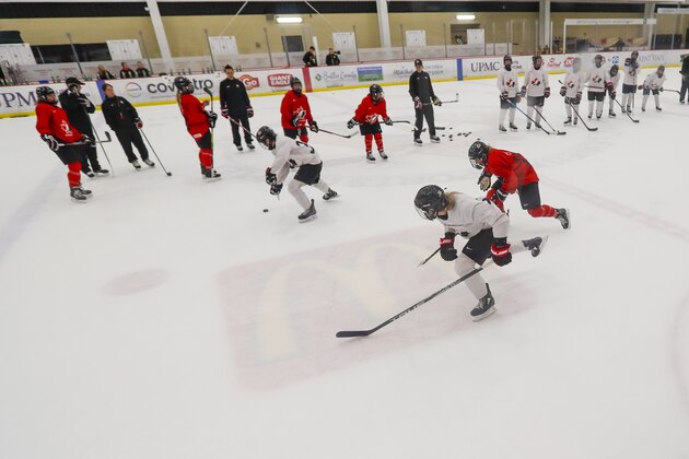 In this photo  taken Monday, Nov. 4, 2019, members of the Canada Women's National hockey team drill during their practice in Cranberry Township, Butler County, Pa. Many of the top women’s hockey players on the planet say they’re resolute in their decision to not play professionally in North America until a new league that provides better pay and better benefits materializes. (AP Photo/Keith Srakocic)