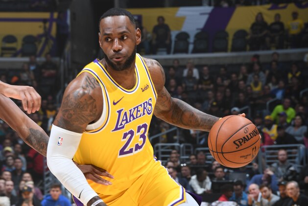 LOS ANGELES, CA - NOVEMBER 19: LeBron James #23 of the Los Angeles Lakers handles the ball against the Oklahoma City Thunder on November 19, 2019 at STAPLES Center in Los Angeles, California. NOTE TO USER: User expressly acknowledges and agrees that, by downloading and/or using this Photograph, user is consenting to the terms and conditions of the Getty Images License Agreement. Mandatory Copyright Notice: Copyright 2019 NBAE (Photo by Andrew D. Bernstein/NBAE via Getty Images)