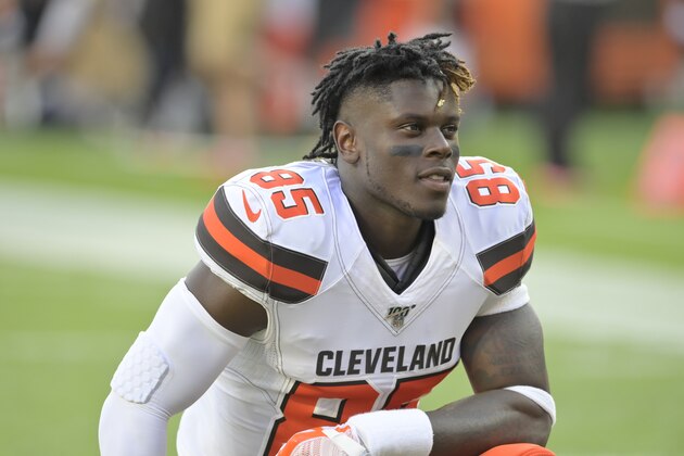 Cleveland Browns tight end David Njoku kneels on the field before an NFL preseason football game against the Washington Redskins, Thursday, Aug. 8, 2019, in Cleveland. Cleveland won 30-10. (AP Photo/David Richard)