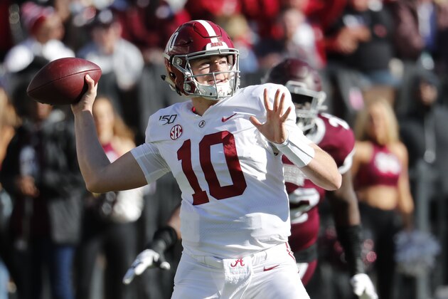 Alabama quarterback Mac Jones (10) rears back to pass downfield as a Mississippi State defender pursues during the second half of an NCAA college football game in Starkville, Miss., Saturday, Nov. 16, 2019. Alabama won 38-7. (AP Photo/Rogelio V. Solis)