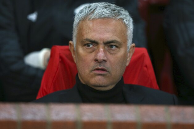 FILE - In this Tuesday, Oct. 23, 2018. file photo, Manchester United coach Jose Mourinho sits on the bench during the Champions League group H soccer match between Manchester United and Juventus at Old Trafford, Manchester, England. Manchester United announced Tuesday Dec. 18, 2018, Jose Mourinho has left the Premier League club with immediate effect. (AP Photo/Dave Thompson, File)