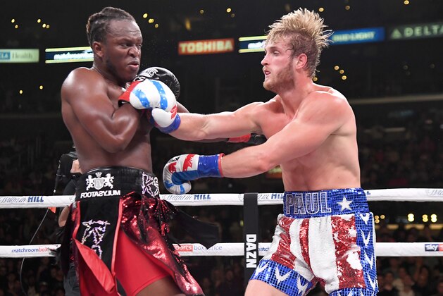 LOS ANGELES, CA - NOVEMBER 09: Logan Paul (red/white/blue shorts) and KSI (black/red shorts) exchange punches their pro debut cruiserweight fight at Staples Center on November 9, 2019 in Los Angeles, California. KSI won by decision. (Photo by Jayne Kamin-Oncea/Getty Images)