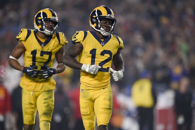 Los Angeles Rams wide receiver Brandin Cooks, right, and wide receiver Robert Woods run to line up during the second half of an NFL football game, Monday, Nov. 19, 2018, in Los Angeles. (AP Photo/Kelvin Kuo)
