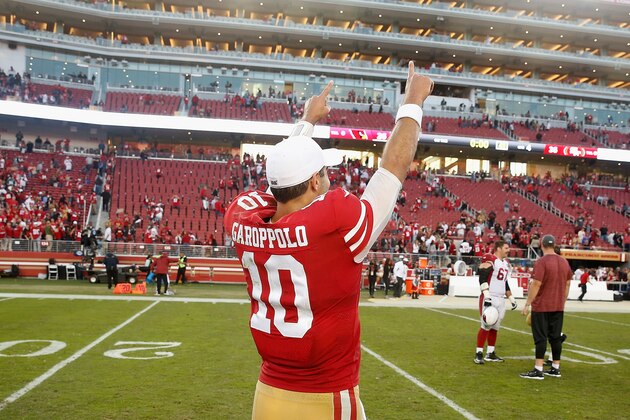 SANTA CLARA, CALIFORNIA - NOVEMBER 17: Quarterback Jimmy Garoppolo #10 of the San Francisco 49ers celebrates after a win against the Arizona Cardinals at Levi's Stadium on November 17, 2019 in Santa Clara, California. (Photo by Lachlan Cunningham/Getty Images)