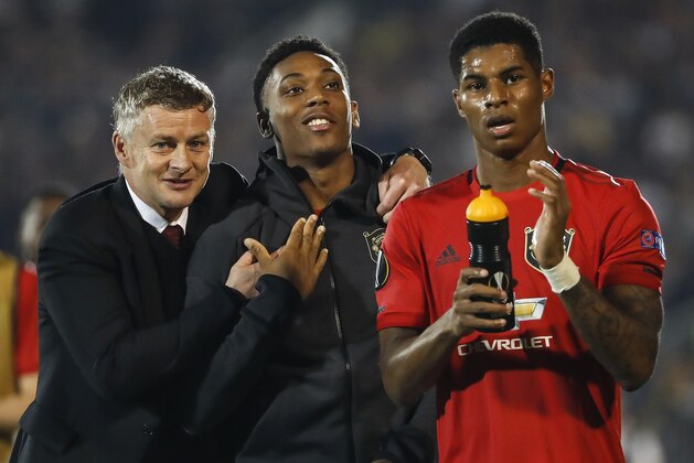 BELGRADE, SERBIA - OCTOBER 24: (L-R) Manager Ole Gunnar Solskjaer, Anthony Martial and Marcus Rashford of Manchester United celebrate after the UEFA Europa League group L match between Partizan and Manchester United at Partizan Stadium on October 24, 2019 in Belgrade, Serbia. (Photo by Srdjan Stevanovic/Getty Images)