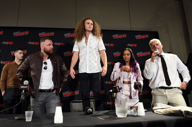 NEW YORK, NEW YORK - OCTOBER 04: (L-R) Jon Moxley, Jack Perry aka Jungle Boy, Brandi Rhodes, and Cody Rhodes attends the All Elite Wrestling panel during 2019 New York Comic Con at Jacob Javits Center on October 04, 2019 in New York City. (Photo by Noam Galai/Getty Images for WarnerMedia Company)