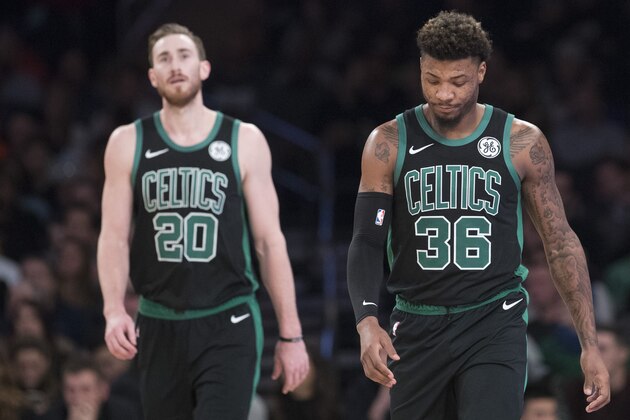 Boston Celtics guard Marcus Smart (36) and forward Gordon Hayward (20) react during the first half of an NBA basketball game against the New York Knicks, Friday, Feb. 1, 2019, at Madison Square Garden in New York. (AP Photo/Mary Altaffer)