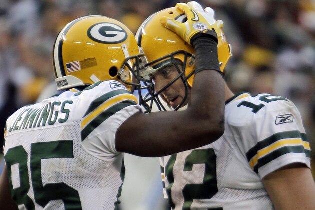 Green Bay Packers quarterback Aaron Rodgers, right, and receiver Greg Jennings congratulate each other after connecting on a four yard touchdown pass in the fourth quarter of the Packers' 45-38 victory over the San Diego Chargers in an NFL football game, Sunday, Nov. 6, 2011, in San Diego. (AP Photo/Lenny Ignelzi)