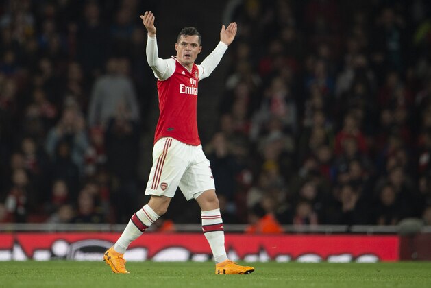 LONDON, ENGLAND - OCTOBER 27: Granit Xhaka of Arsenal reacts to the crowd after being substituted by Manager  Unai Emery during the Premier League match between Arsenal FC and Crystal Palace at Emirates Stadium on October 27, 2019 in London, United Kingdom. (Photo by Visionhaus)