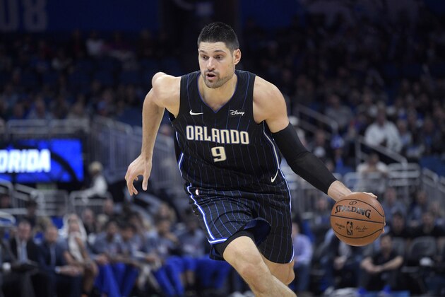 Orlando Magic center Nikola Vucevic (9) drives to the basket during the first half of an NBA basketball game against the San Antonio Spurs Friday, Nov. 15, 2019, in Orlando, Fla. (AP Photo/Phelan M. Ebenhack)