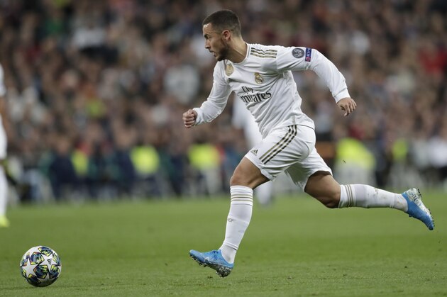 Real Madrid's Eden Hazard controls the ball during a Champions League group A soccer match between Real Madrid and Galatasaray at the Santiago Bernabeu stadium in Madrid, Wednesday, Nov. 6, 2019. (AP Photo/Bernat Armangue)
