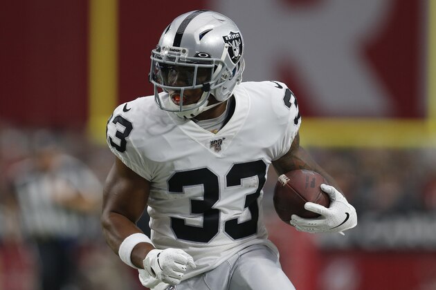 Oakland Raiders running back DeAndre Washington (33) runs against the Arizona Cardinals during the first half of an an NFL football game, Thursday, Aug. 15, 2019, in Glendale, Ariz. (AP Photo/Ralph Freso)