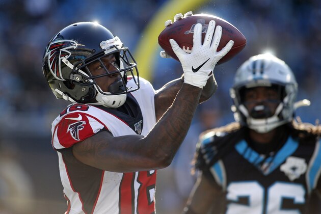 Atlanta Falcons wide receiver Calvin Ridley (18) catches a touchdown pass during the second half of an NFL football game against the Carolina Panthers in Charlotte, N.C., Sunday, Nov. 17, 2019. (AP Photo/Brian Blanco)