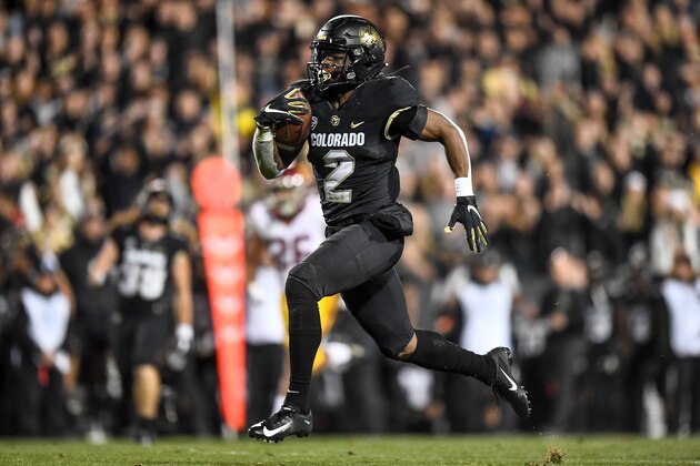 BOULDER, CO - OCTOBER 25:  Laviska Shenault Jr. #2 of the Colorado Buffaloes carries the ball for a 73-yard touchdown catch against the USC Trojans in the third quarter of a game at Folsom Field on October 25, 2019 in Boulder, Colorado.  (Photo by Dustin Bradford/Getty Images)