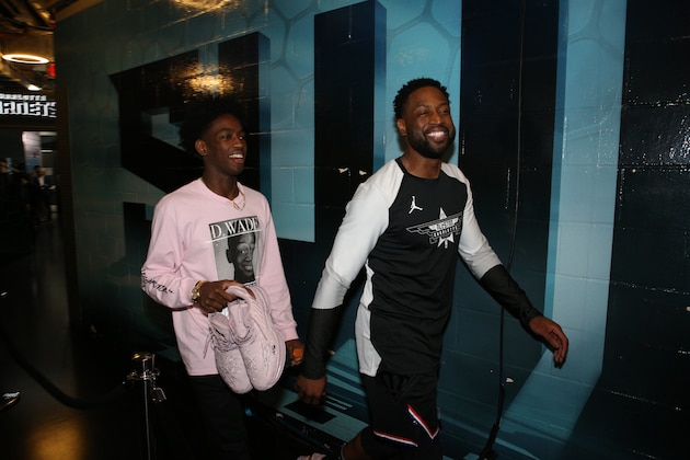 CHARLOTTE, NC - FEBRUARY 17: Zaire Wade and Dwyane Wade walk the tunnel prior to the 2019 NBA All-Star Game on February 17, 2019 at the Spectrum Center in Charlotte, North Carolina. NOTE TO USER: User expressly acknowledges and agrees that, by downloading and/or using this photograph, user is consenting to the terms and conditions of the Getty Images License Agreement. Mandatory Copyright Notice: Copyright 2019 NBAE (Photo by Chris Marion/NBAE via Getty Images)