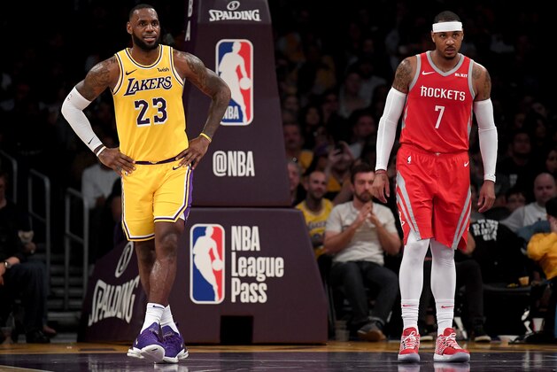 LOS ANGELES, CA - OCTOBER 20:  LeBron James #23 of the Los Angeles Lakers and Carmelo Anthony #7 of the Houston Rockets wait for and inbound at Staples Center on October 20, 2018 in Los Angeles, California.  (Photo by Harry How/Getty Images)