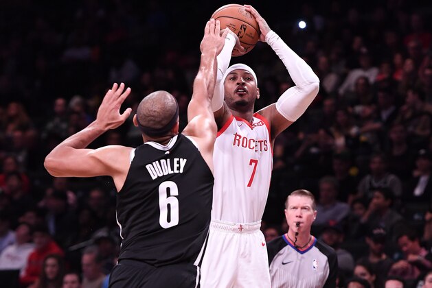 NEW YORK, NY - NOVEMBER 02: Carmelo Anthony #7 of the Houston Rockets shoots the ball against Jared Dudley #6 of the Brooklyn Nets during the game at Barclays Center on November 02, 2018 in the Brooklyn borough of New York City. NOTE TO USER: User expressly acknowledges and agrees that, by downloading and or using this photograph, User is consenting to the terms and conditions of the Getty Images License Agreement. (Photo by Matteo Marchi/Getty Images)