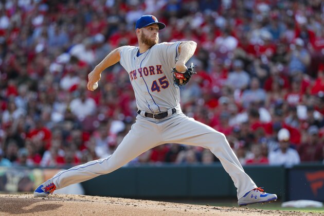 New York Mets starting pitcher Zack Wheeler throws in the second inning of a baseball game against the Cincinnati Reds, Saturday, Sept. 21, 2019, in Cincinnati. (AP Photo/John Minchillo)