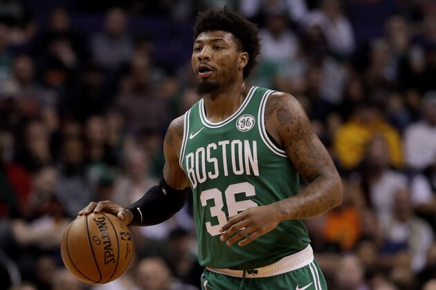 Boston Celtics guard Marcus Smart (36) against the Phoenix Suns during the first half of an NBA basketball game, Monday, Nov. 18, 2019, in Phoenix. (AP Photo/Matt York)