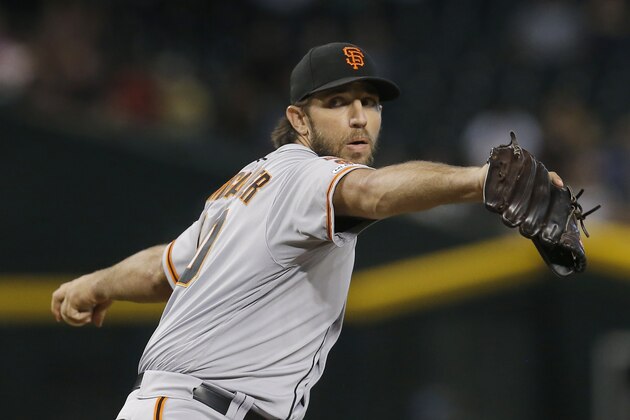 San Francisco Giants pitcher Madison Bumgarner throws against the Arizona Diamondbacks in the first inning of a baseball game, Sunday, Aug. 18, 2019, in Phoenix. (AP Photo/Rick Scuteri)