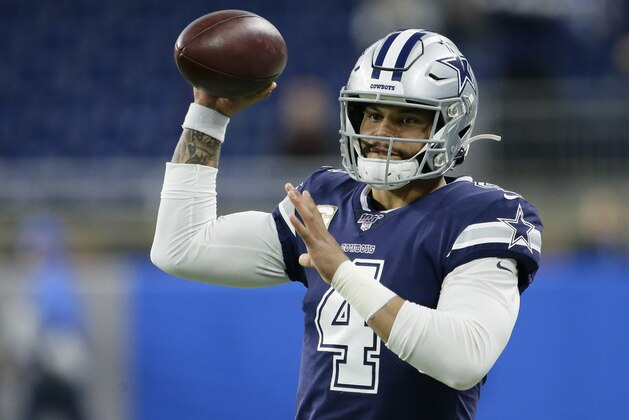 Dallas Cowboys quarterback Dak Prescott (4) passes the ball during pregame of an NFL football game against the Detroit Lions, Sunday, Nov. 17, 2019, in Detroit. (AP Photo/Duane Burleson)