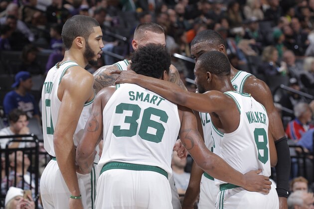 SACRAMENTO, CA - NOVEMBER 17: Jayson Tatum #0, Marcus Smart #36, Daniel Theis #27, Kemba Walker #8 and Jaylen Brown #7 of the Boston Celtics huddle during the game against the Sacramento Kings on November 17, 2019 at Golden 1 Center in Sacramento, California. NOTE TO USER: User expressly acknowledges and agrees that, by downloading and or using this photograph, User is consenting to the terms and conditions of the Getty Images Agreement. Mandatory Copyright Notice: Copyright 2019 NBAE (Photo by Rocky Widner/NBAE via Getty Images)