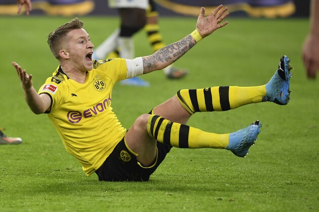 Dortmund's German forward Marco Reus reacts during the German first division Bundesliga football match Borussia Dortmund v SC Paderborn in Dortmund, western Germany, on November 22, 2019. (Photo by INA FASSBENDER / AFP) / RESTRICTIONS: DFL REGULATIONS PROHIBIT ANY USE OF PHOTOGRAPHS AS IMAGE SEQUENCES AND/OR QUASI-VIDEO (Photo by INA FASSBENDER/AFP via Getty Images)