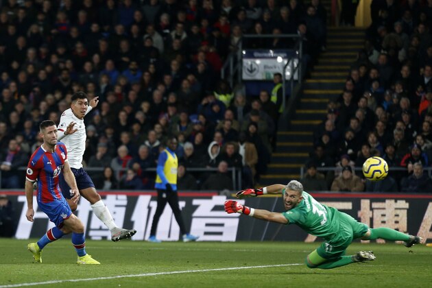 Liverpool's Brazilian midfielder Roberto Firmino (2nd L) watches his shot go wide during the English Premier League football match between Crystal Palace and Liverpool at Selhurst Park in south London on November 23, 2019. (Photo by Ian KINGTON / AFP) / RESTRICTED TO EDITORIAL USE. No use with unauthorized audio, video, data, fixture lists, club/league logos or 'live' services. Online in-match use limited to 120 images. An additional 40 images may be used in extra time. No video emulation. Social media in-match use limited to 120 images. An additional 40 images may be used in extra time. No use in betting publications, games or single club/league/player publications. /  (Photo by IAN KINGTON/AFP via Getty Images)