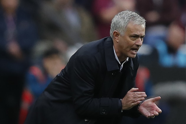 Tottenham Hotspur's Portuguese head coach Jose Mourinho reacts on the sidelines during the English Premier League football match between West Ham United and Tottenham Hotspur at The London Stadium, in east London on November 23, 2019. (Photo by Adrian DENNIS / AFP) / RESTRICTED TO EDITORIAL USE. No use with unauthorized audio, video, data, fixture lists, club/league logos or 'live' services. Online in-match use limited to 120 images. An additional 40 images may be used in extra time. No video emulation. Social media in-match use limited to 120 images. An additional 40 images may be used in extra time. No use in betting publications, games or single club/league/player publications. /  (Photo by ADRIAN DENNIS/AFP via Getty Images)