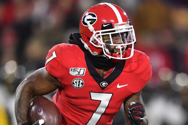 Georgia running back D'Andre Swift rushes against Missouri during an NCAA college football game Saturday, Nov. 9, 2019, in Athens, Ga. (AP Photo/John Amis)