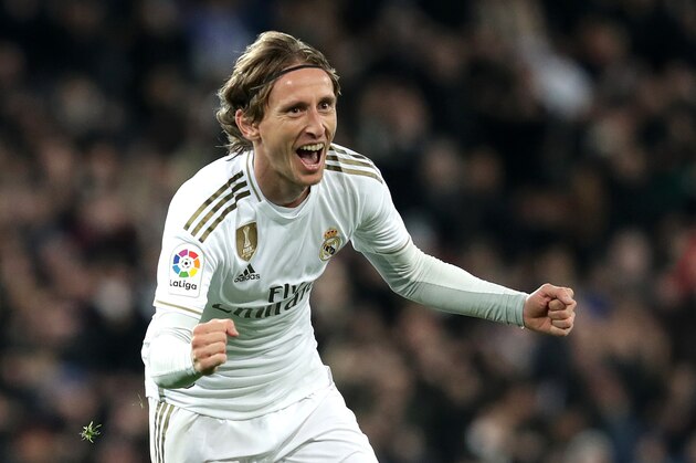 MADRID, SPAIN - NOVEMBER 23: Luka Modric of Real Madrid celebrates after scoring his team's third goal  during the La Liga match between Real Madrid CF and Real Sociedad at Estadio Santiago Bernabeu on November 23, 2019 in Madrid, Spain. (Photo by Gonzalo Arroyo Moreno/Getty Images)