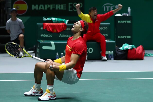 MADRID, SPAIN - NOVEMBER 23: Rafael Nadal of Spain, playing partner of Feliciano Lopez of Spain celebrate match point in their semi-final doubles match against Jamie Murray and Neal Skupski of Great Britain during Day 6 of the 2019 Davis Cup at La Caja Magica on November 23, 2019 in Madrid, Spain. (Photo by Clive Brunskill/Getty Images for LTA)