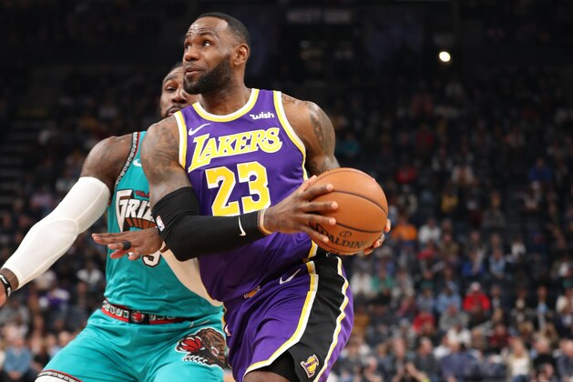 MEMPHIS, TN - NOVEMBER 23: LeBron James #23 of the Los Angeles Lakers handles the ball against the Memphis Grizzlies on November 23, 2019 at FedExForum in Memphis, Tennessee. NOTE TO USER: User expressly acknowledges and agrees that, by downloading and or using this photograph, User is consenting to the terms and conditions of the Getty Images License Agreement. Mandatory Copyright Notice: Copyright 2019 NBAE (Photo by Nikki Boertman/NBAE via Getty Images)