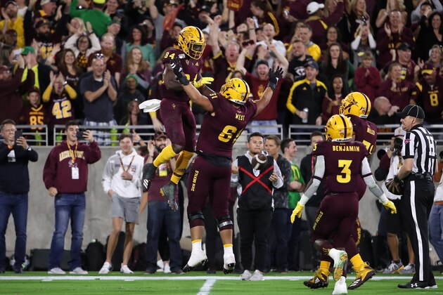 TEMPE, ARIZONA - NOVEMBER 23: Wide receiver Frank Darby #84 of the Arizona State Sun Devils celebrates with Dohnovan West #61 after scoring on a 57 yard touchdown reception against the Oregon Ducks during the first half of the NCAAF game at Sun Devil Stadium on November 23, 2019 in Tempe, Arizona. (Photo by Christian Petersen/Getty Images)