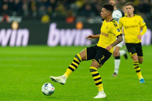 DORTMUND, GERMANY - NOVEMBER 22: Jadon Sancho of Borussia Dortmund controls the ball during the Bundesliga match between Borussia Dortmund and SC Paderborn 07 at Signal Iduna Park on November 22, 2019 in Dortmund, Germany. (Photo by TF-Images/Getty Images)