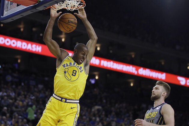 Golden State Warriors' Andre Iguodala (9) scores next to Indiana Pacers' Domantas Sabonis during the second half of an NBA basketball game Thursday, March 21, 2019, in Oakland, Calif. (AP Photo/Ben Margot) Golden State Warriors' Andre Iguodala (9) scores next to Indiana Pacers' Domantas Sabonis during the second half of an NBA basketball game Thursday, March 21, 2019, in Oakland, Calif. (AP Photo/Ben Margot)