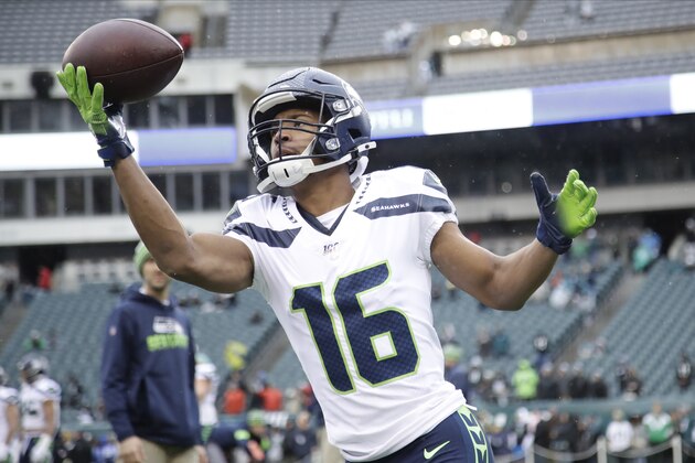 Seattle Seahawks' Tyler Lockett warms up before an NFL football game against the Philadelphia Eagles, Sunday, Nov. 24, 2019, in Philadelphia. (AP Photo/Matt Rourke)