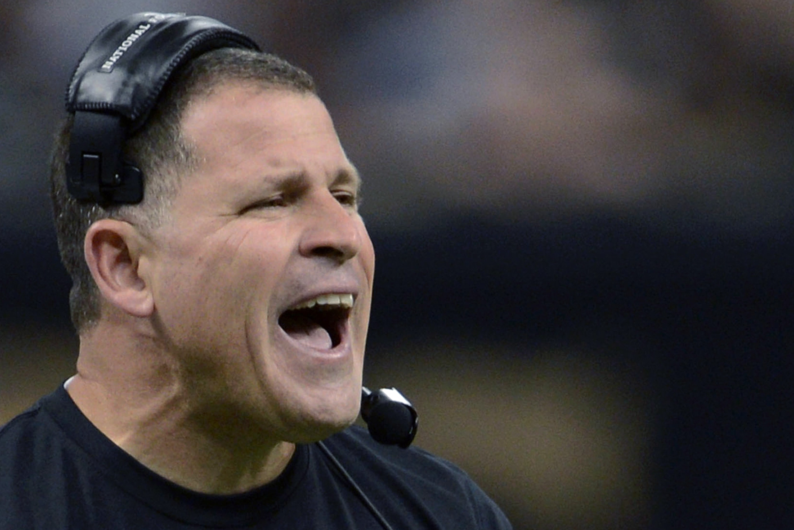 FILE - In this Dec. 29, 2013, file photo, then-Tampa Bay Buccaneers head coach Greg Schiano reacts on the sideline in the first half of an NFL football game against the New Orleans Saints, in New Orleans. Ohio State’s ball-hawking defense has given quarterbacks fits in the first two games against overmatched opponents. But it will be a different ballgame against Oklahoma. “Big boy football,” is how Ohio State defensive coordinator Greg Schiano put it. (AP Photo/Bill Feig, File)