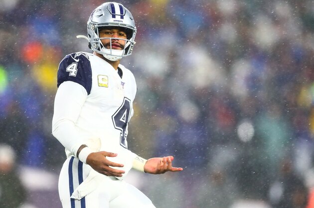 FOXBOROUGH, MA - NOVEMBER 24:   Dak Prescott #4 of the Dallas Cowboys reacts during a game against the New England Patriots at Gillette Stadium on November 24, 2019 in Foxborough, Massachusetts.  (Photo by Adam Glanzman/Getty Images)