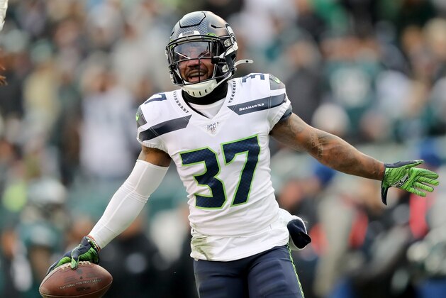PHILADELPHIA, PENNSYLVANIA - NOVEMBER 24:  Quandre Diggs #37 of the Seattle Seahawks celebrates after the Eagles are unable to get the first down at Lincoln Financial Field on November 24, 2019 in Philadelphia, Pennsylvania.The Seattle Seahawks defeated the Philadelphia Eagles 17-9. (Photo by Elsa/Getty Images)