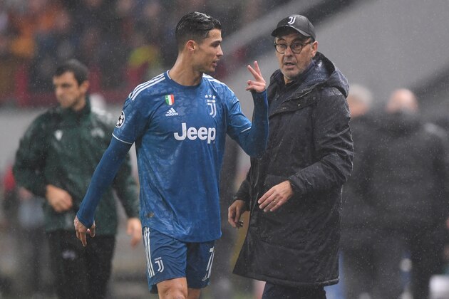 Juventus' Portuguese forward Cristiano Ronaldo and Juventus' Italian coach Maurizio Sarri during the UEFA Champions League group D football match between FC Lokomotiv Moscow and Juventus at Moscow's RZD Arena stadium on November 6, 2019. (Photo by Kirill KUDRYAVTSEV / AFP) (Photo by KIRILL KUDRYAVTSEV/AFP via Getty Images)