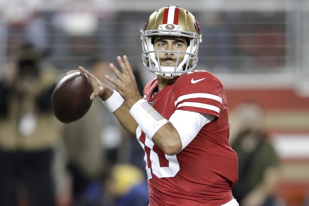 San Francisco 49ers quarterback Jimmy Garoppolo (10) passes against the Green Bay Packers during the first half of an NFL football game in Santa Clara, Calif., Sunday, Nov. 24, 2019. (AP Photo/Ben Margot)