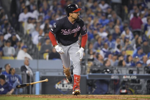 Washington Nationals' Anthony Rendon watches his home run against the Los Angeles Dodgers during the eighth inning in Game 5 of a baseball National League Division Series on Wednesday, Oct. 9, 2019, in Los Angeles. (AP Photo/Mark J. Terrill)