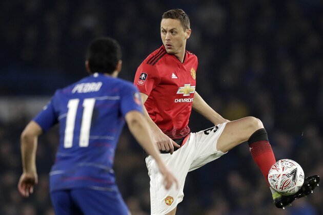 Manchester United's Nemenja Matic, right, controls the ball in front Chelsea's Pedro during the English FA Cup fifth round soccer match between Chelsea and Manchester United at Stamford Bridge stadium in London, Monday, Feb. 18, 2019. (AP Photo/Matt Dunham)