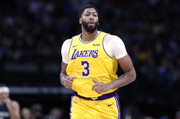 Los Angeles Lakers forward Anthony Davis (3) jogs up court during an NBA basketball game against the Dallas Mavericks in Dallas, Friday, Nov. 1, 2019. (AP Photo/Tony Gutierrez)