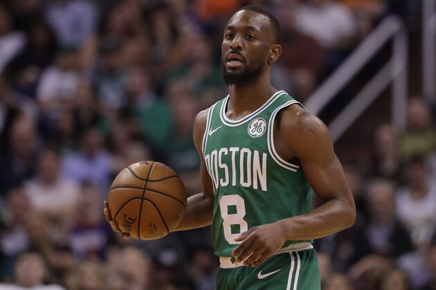 Boston Celtics guard Kemba Walker (8) against the Phoenix Suns during the first half of an NBA basketball game, Monday, Nov. 18, 2019, in Phoenix. (AP Photo/Matt York)