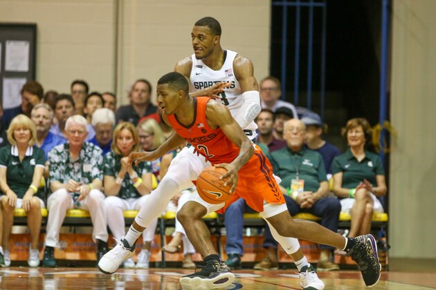 LAHAINA, HI - NOVEMBER 25: Landers Nolley II #2 of the Virginia Tech Hokies drives to the basket around Xavier Tillman #23 of the Michigan State Spartans during the first half at the Lahaina Civic Center on November 25, 2019 in Lahaina, Hawaii. (Photo by Darryl Oumi/Getty Images)