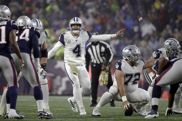 Dallas Cowboys quarterback Dak Prescott calls signals at the line of scrimmage in the first half of an NFL football game against the New England Patriots, Sunday, Nov. 24, 2019, in Foxborough, Mass. (AP Photo/Elise Amendola)